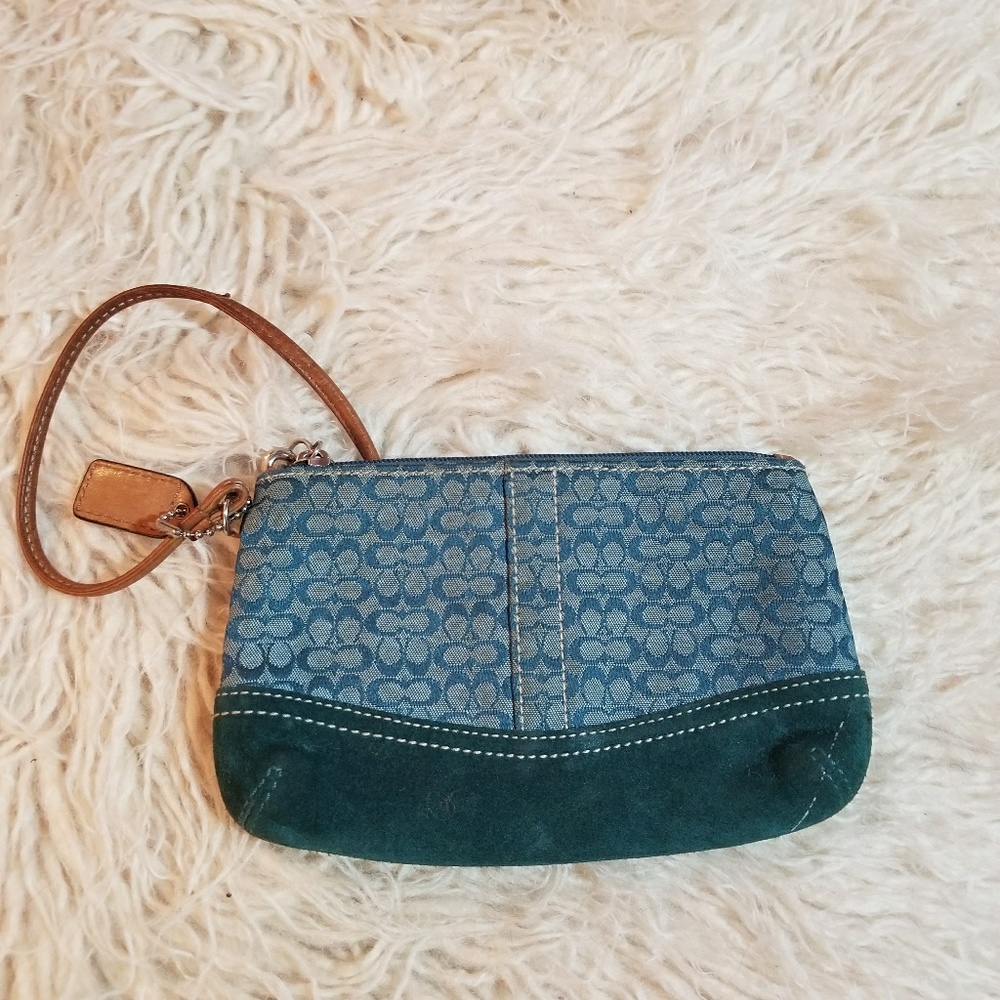 Coach blue wristlet with small c bottom is suede
